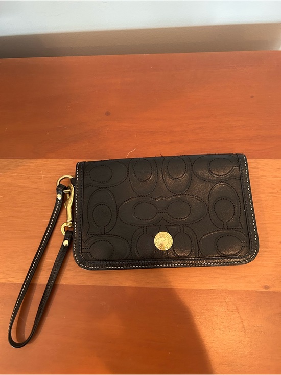 Coach Handbags - Vintage Coach Logo Embossed Leather Wristlet Black